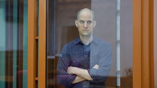 <div class="paragraphs"><p>Evan Gershkovich, who stands trial on spying charges, is seen inside an enclosure for defendants before a court hearing in Yekaterinburg, Russia June 26, 2024.</p></div>