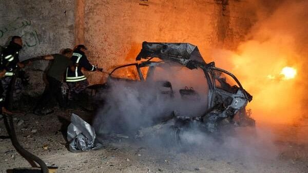 <div class="paragraphs"><p>Aftermath of an Israeli raid, in Kafr Dan.</p></div>