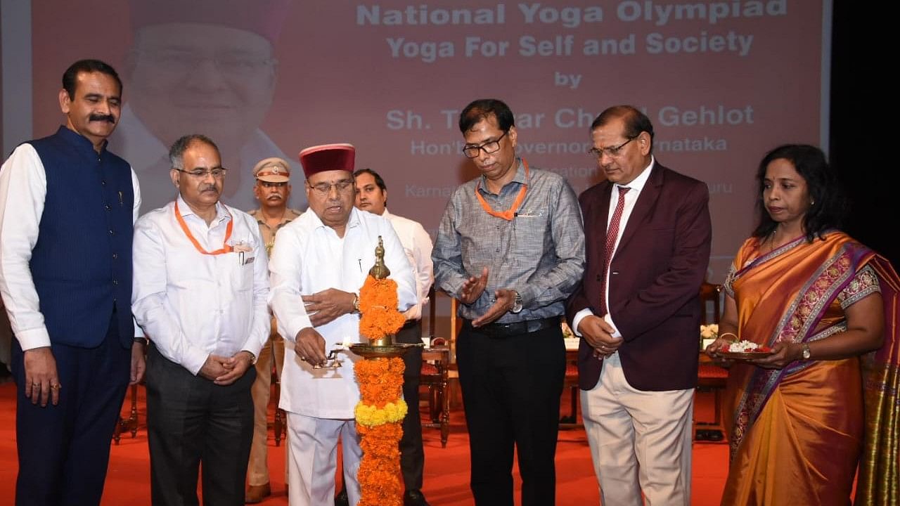 <div class="paragraphs"><p>Governor Thawar Chand Gehlot inaugurates the National Yoga Olympiad 2024, at the Convocation Hall of Karnataka State Open University in Mysuru on Tuesday.&nbsp;<br></p></div>