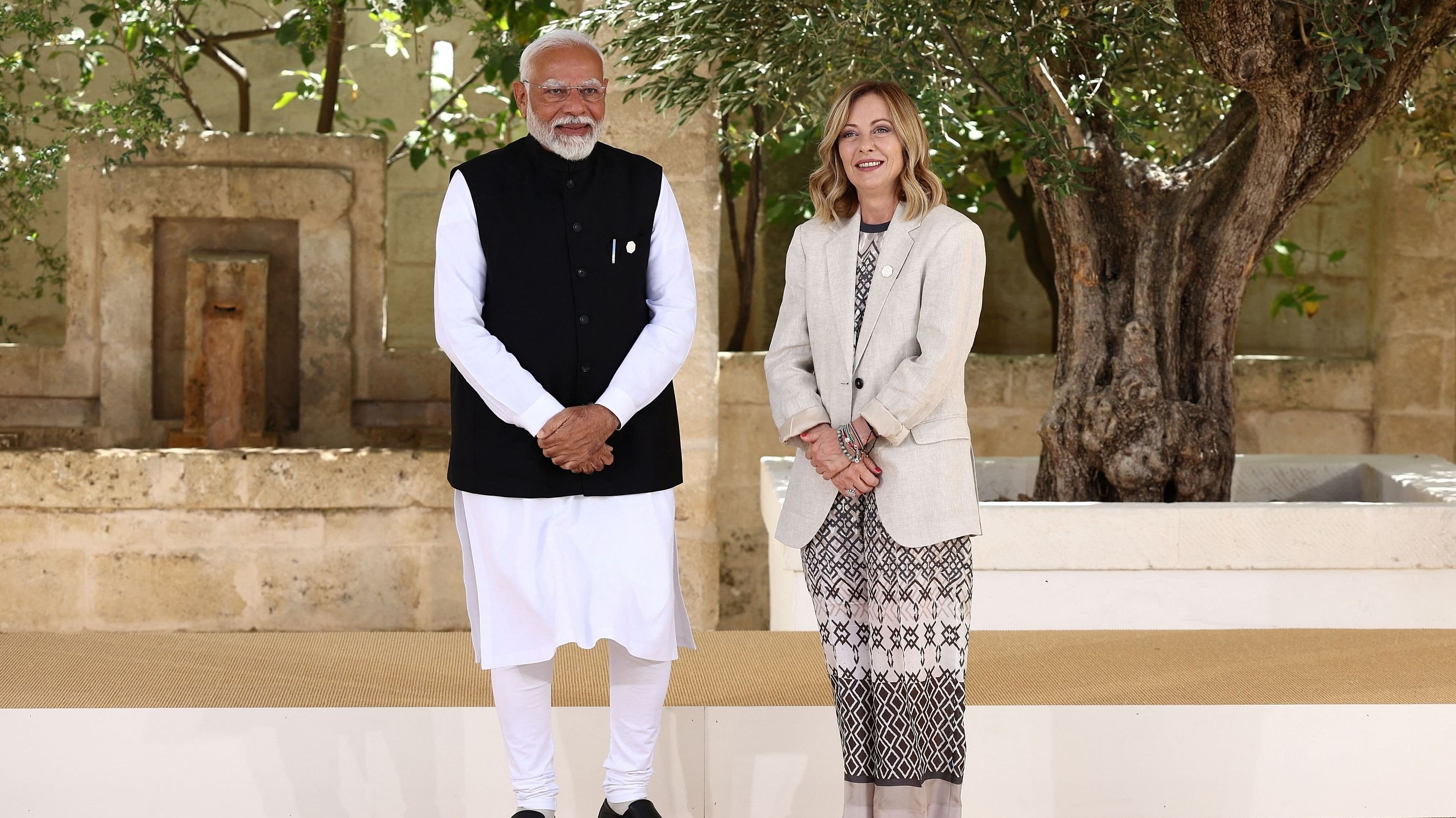 <div class="paragraphs"><p>Prime Minister Narendra Modi is welcomed by Italian Prime Minister Giorgia Meloni on the second day of the G7 summit, at the Borgo Egnazia resort, in Savelletri, Italy June 14, 2024.</p></div>