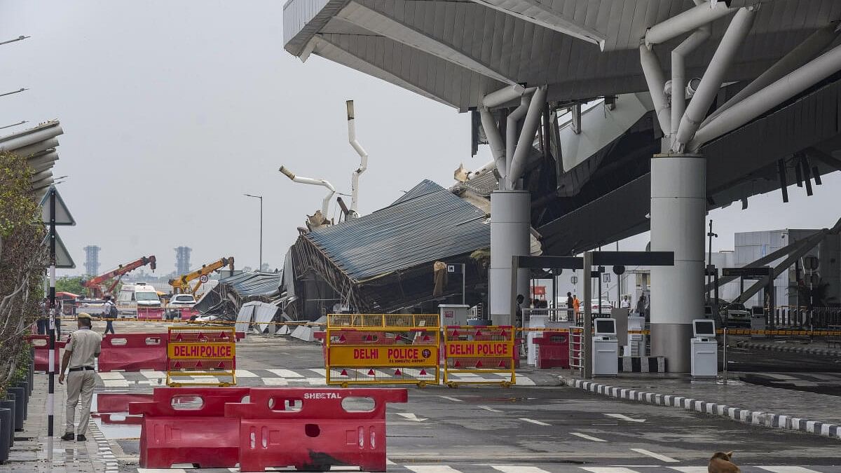 <div class="paragraphs"><p>Restoration and relief work underway at the Terminal-1 of the IGI Airport where a canopy collapsed amid heavy rain, in New Delhi.</p></div>