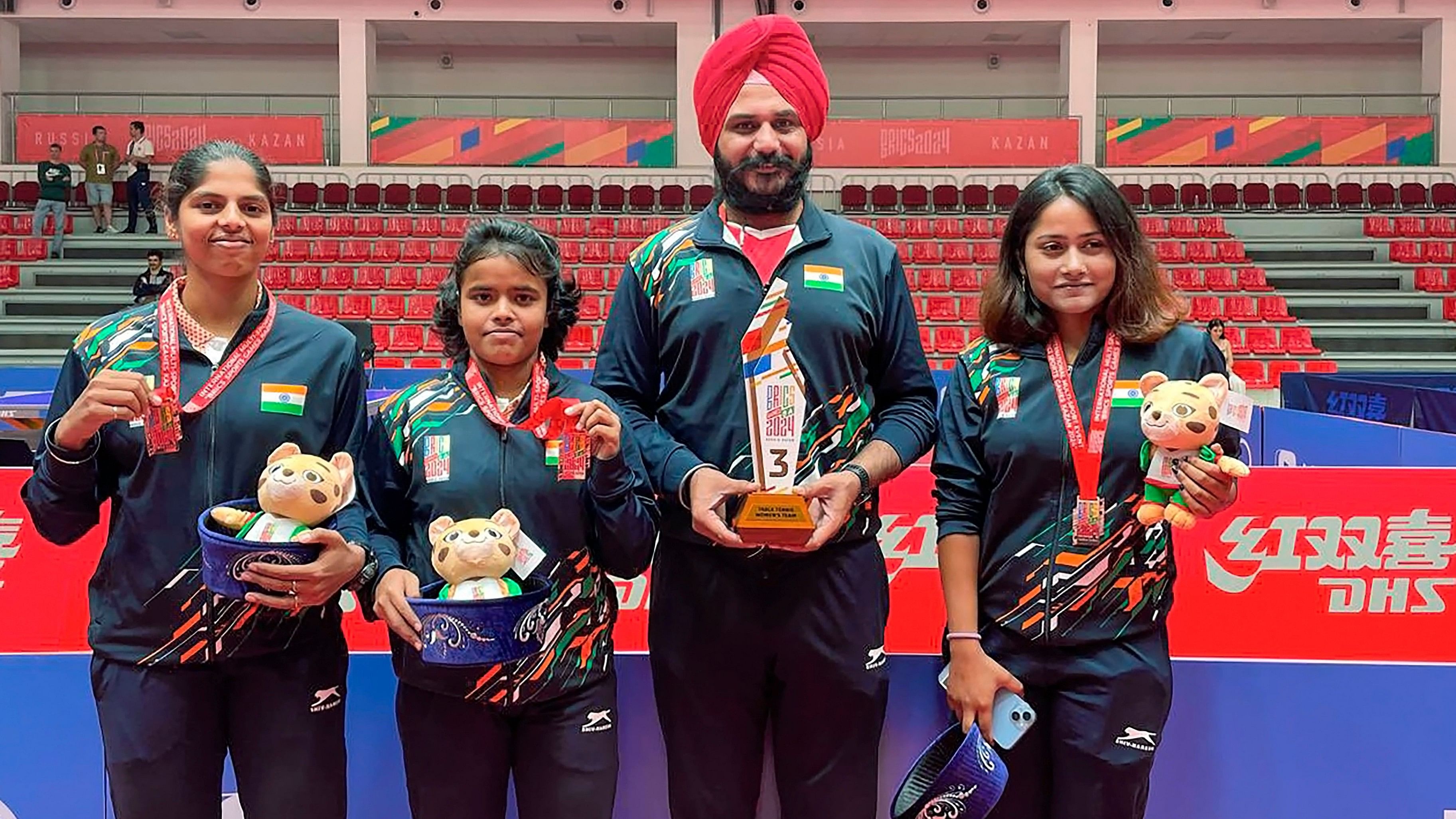 <div class="paragraphs"><p> Indian women's table tennis team players Yashini Sivasankar, Poymantee Baisya and Moumita Dutta pose for photos after winning the bronze medal at the 2024 BRICS Games, in Kazan, Russia. </p></div>