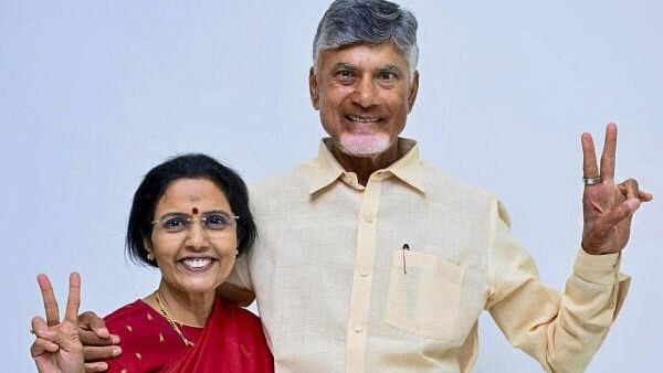 <div class="paragraphs"><p>TDP Chief Chandrababu Naidu with wife Nara Bhuvaneshwari celebrates his party's victory in Assembly and Parliamentay polls, at their residence in Undavalli, Amaravati, Tuesday, June 4, 2024.</p></div>