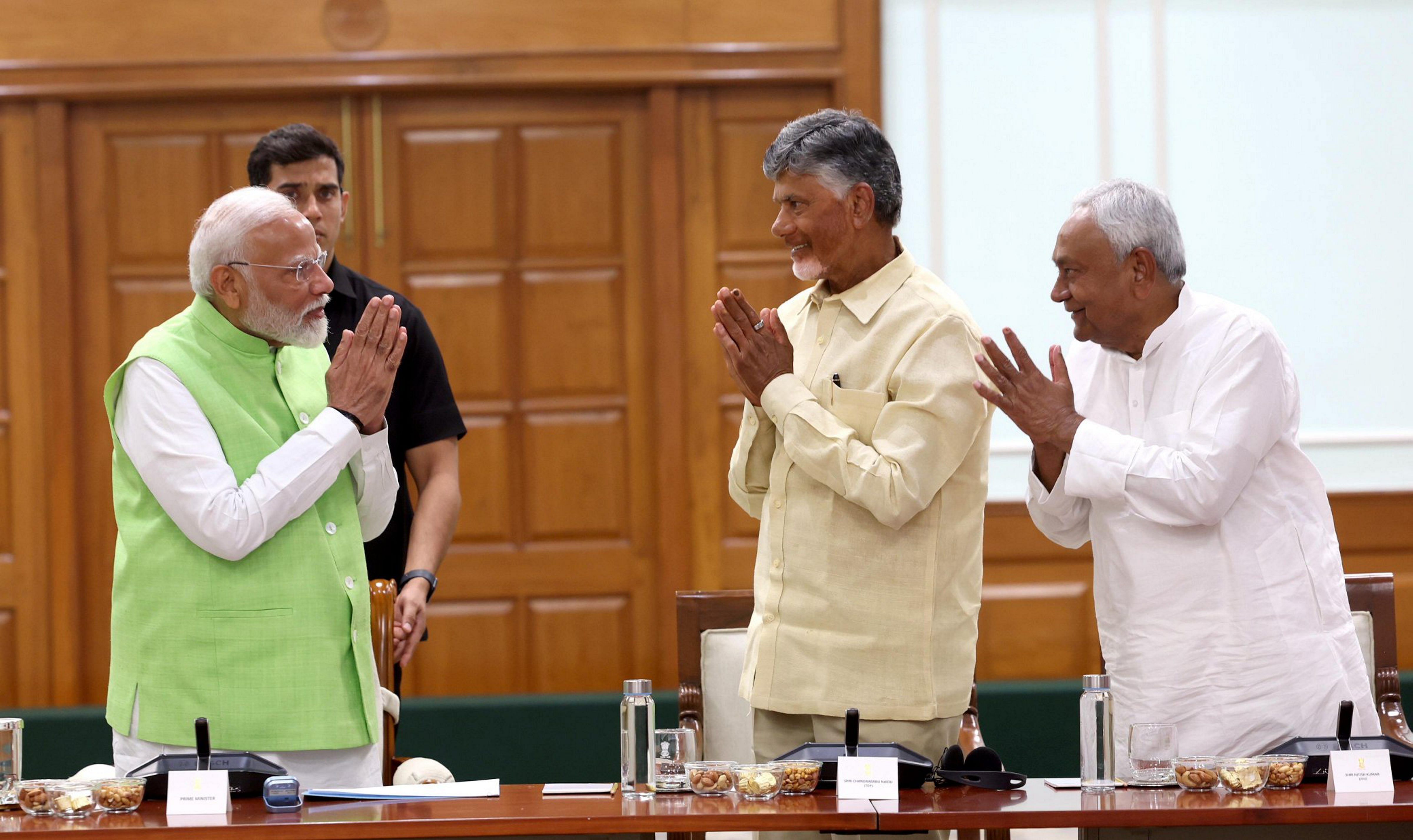 <div class="paragraphs"><p>PM Modi with TDP chief N Chandrababu Naidu and JD(U) chief Nitish Kumar during the NDA meeting in New Delhi, Wednesday, June 5, 2024.</p></div>