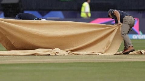 <div class="paragraphs"><p>Rain covers are deployed during the ICC Men's T20 Cricket World Cup series</p></div>