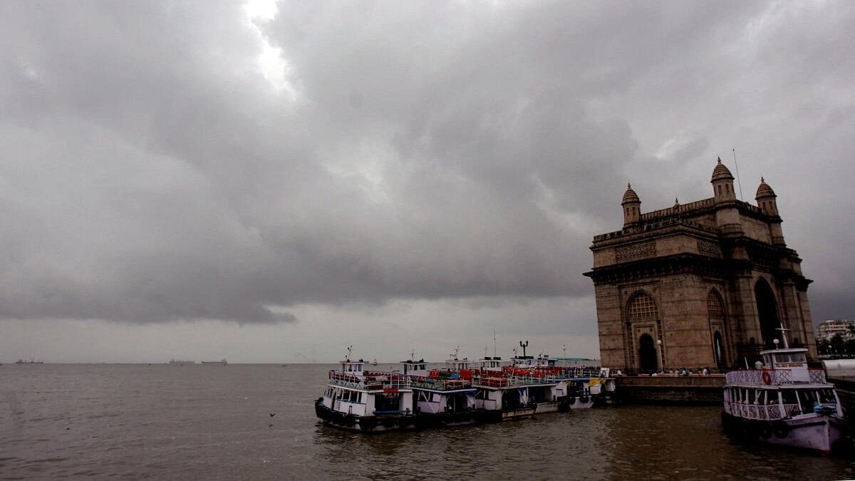 <div class="paragraphs"><p>Monsoon clouds gather over the Gateway of India in Mumbai.</p></div>