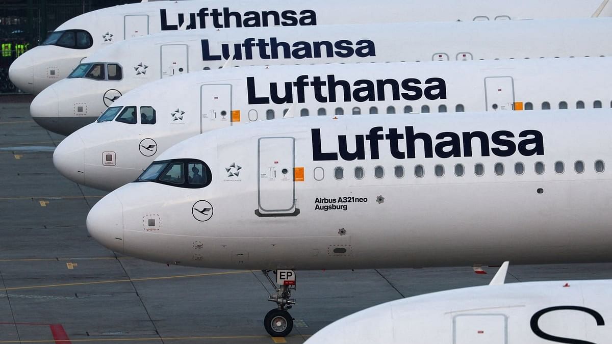 <div class="paragraphs"><p>Lufthansa planes stand parked.</p></div>