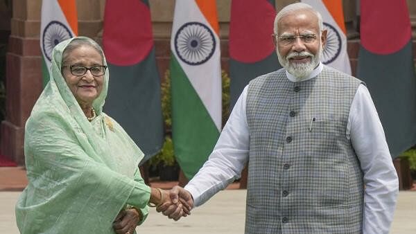 <div class="paragraphs"><p>Prime Minister Narendra Modi with his Bangladeshi counterpart Sheikh Hasina before a meeting, at the Hyderabad House in New Delhi, Saturday, June 22, 2024.</p></div>