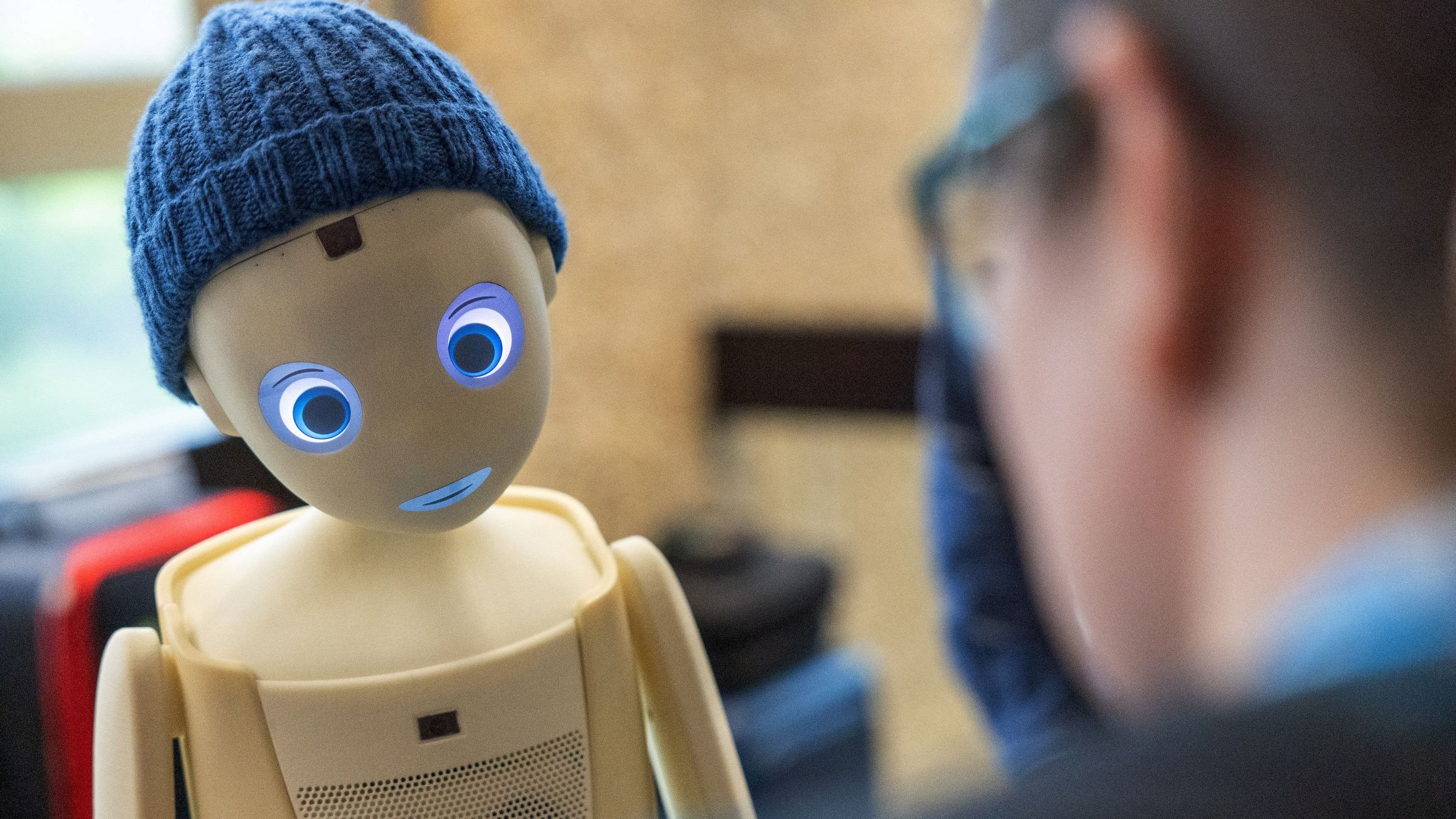 <div class="paragraphs"><p>A visitor talks with the Navel robot, by Navel Robotics, during the AI for Good Global summit on artificial intelligence, organised by the International Telecommunication Union, in Geneva, Switzerland, May 30, 2024. </p></div>