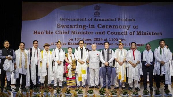 <div class="paragraphs"><p>Arunachal Pradesh Chief Minister Pema Khandu and Governor K.T. Parnaik with newly inducted cabinet ministers during the swearing-in ceremony, in Itanagar.</p></div>