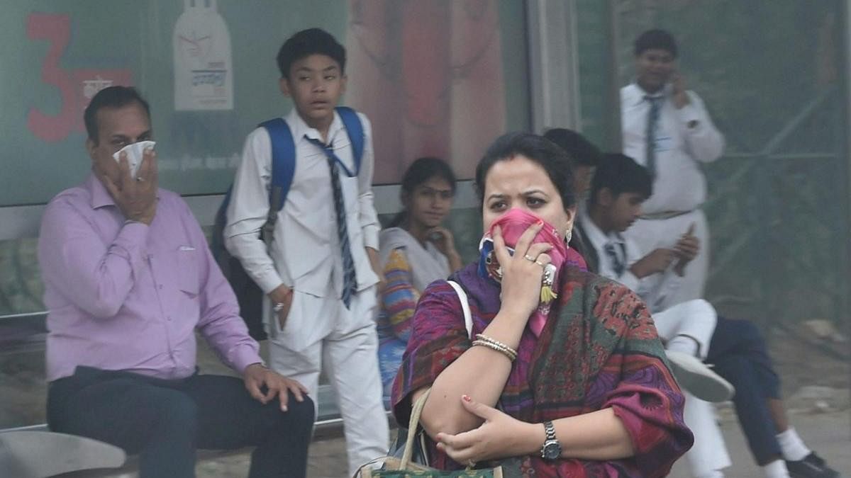 <div class="paragraphs"><p>Representative image of people use handkerchiefs to protect themselves from air pollution.</p></div>