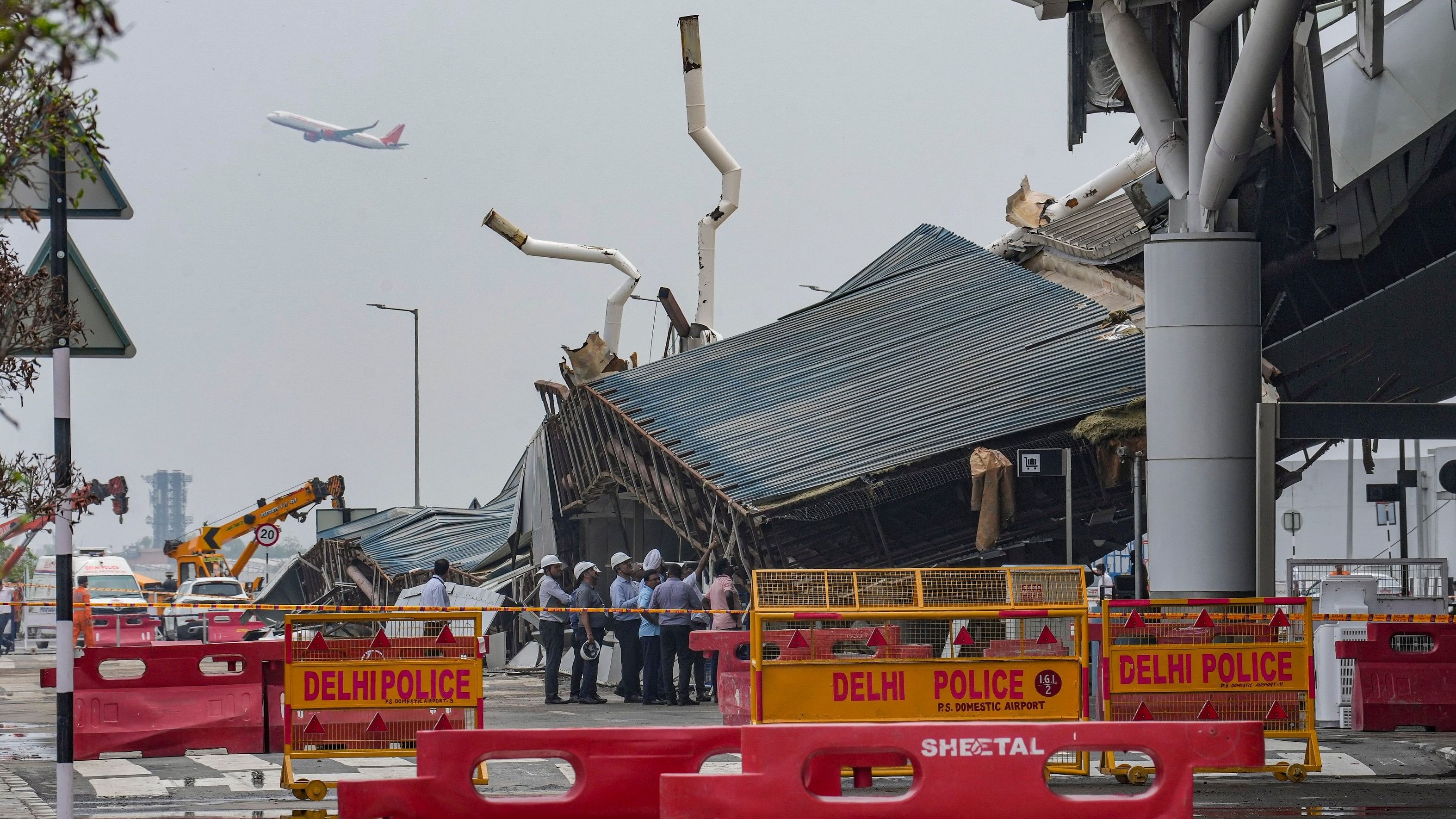 <div class="paragraphs"><p> Restoration and relief work underway after collapse of a canopy at the Terminal 1 of Indira Gandhi International Airport amid heavy rain, in New Delhi, Friday, June 28, 2024.   </p></div>