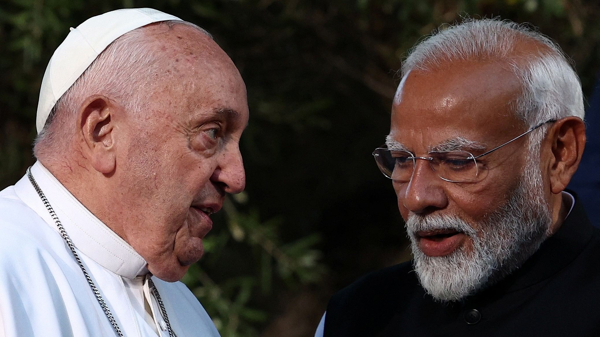 <div class="paragraphs"><p>Pope Francis speaks India’s Prime Minister Narendra Modi as G7 leaders and representatives of States and International Organisations gather for a family photo on the second day of the G7 summit at the Borgo Egnazia resort, in Savelletri, Italy June 14, 2024.</p></div>