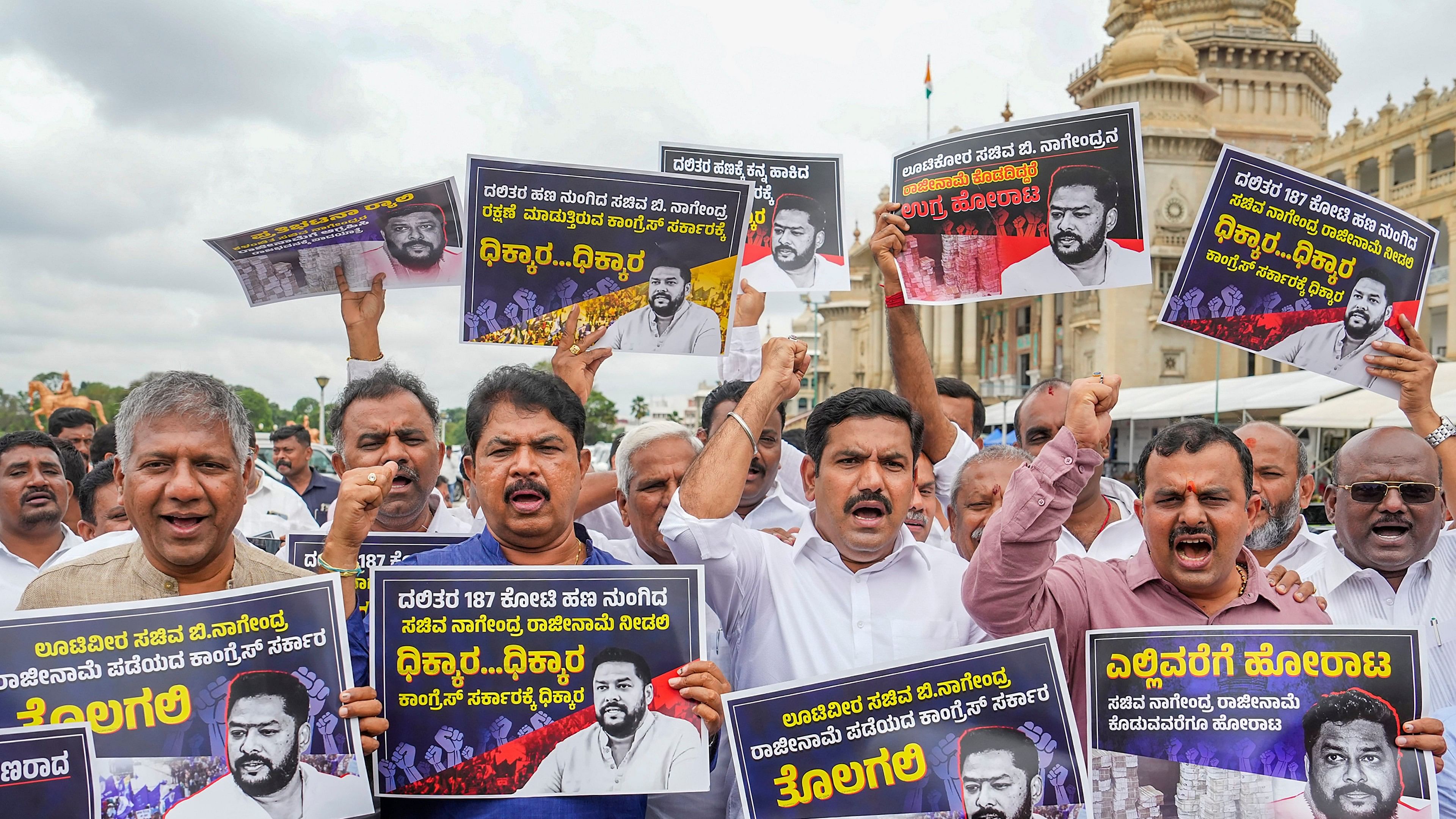 <div class="paragraphs"><p> Opposition leader in Assembly R Ashoka, BJP State President B Y Vijayendra and party MLAs and MPs during a protest march demanding the resignation of ST Minister B Nagendra in Bengaluru, Thursday, June 6,2024. Nagendra, a four-time MLA, is  allegedly involved in the illegal transfer of Rs 187.3 crore from the Karnataka Maharshi Valmiki Scheduled Tribe Development Corporation to corporates.</p></div>
