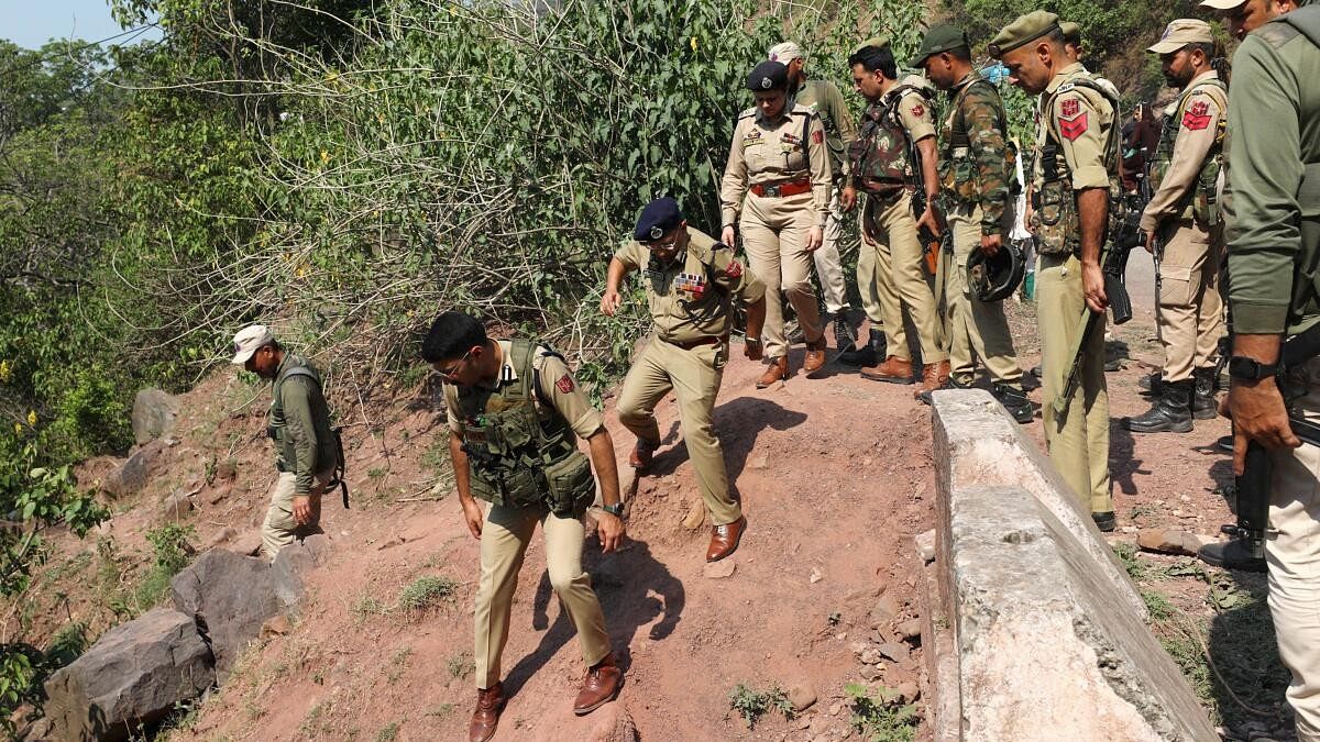 <div class="paragraphs"><p>Security personnel during a search operation after a bus carrying pilgrims was ambushed by terrorists, in Reasi district of Jammu and Kashmir.</p></div>