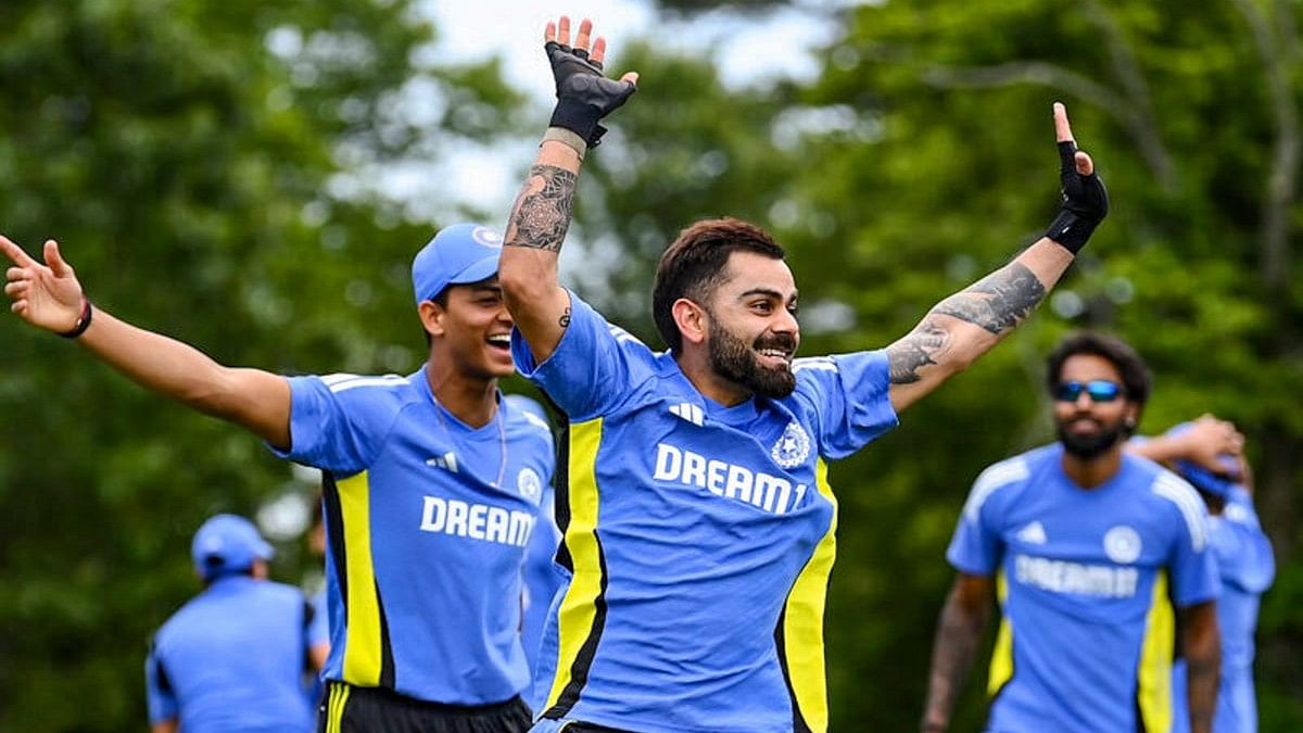 <div class="paragraphs"><p>India's Virat Kohli is in a jovial mood during a training session ahead of their marquee clash against Pakistan in New York.</p></div>