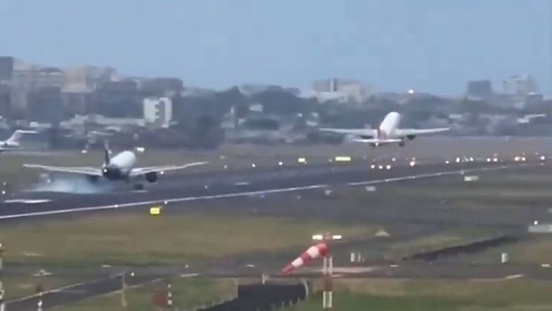 <div class="paragraphs"><p>Screengrab of the 14-second which went viral on social media, showed both the aircrafts on the same runway.</p></div>