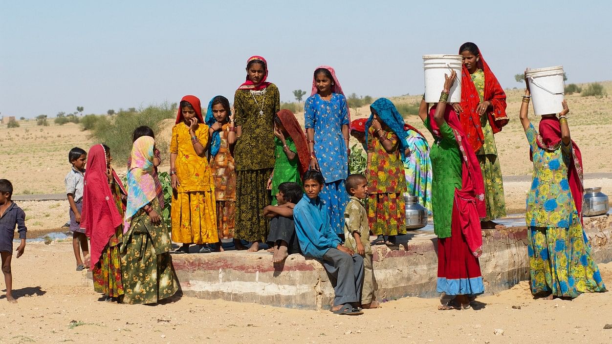 <div class="paragraphs"><p>Representative image showing women carrying buckets of water.</p></div>