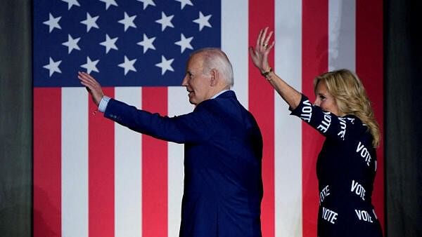 <div class="paragraphs"><p>US President Joe Biden and first lady Jill Biden wave as they exit the stage during a campaign rally in Raleigh, North Carolina, U.S., June 28, 2024. </p></div>