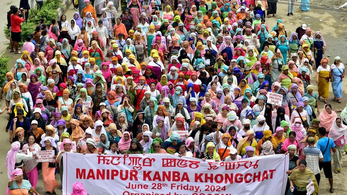 <div class="paragraphs"><p>People take part in a rally organised by the Coordinating Committee on Manipur Integrity (COCOMI) in Imphal, Manipur.</p></div>