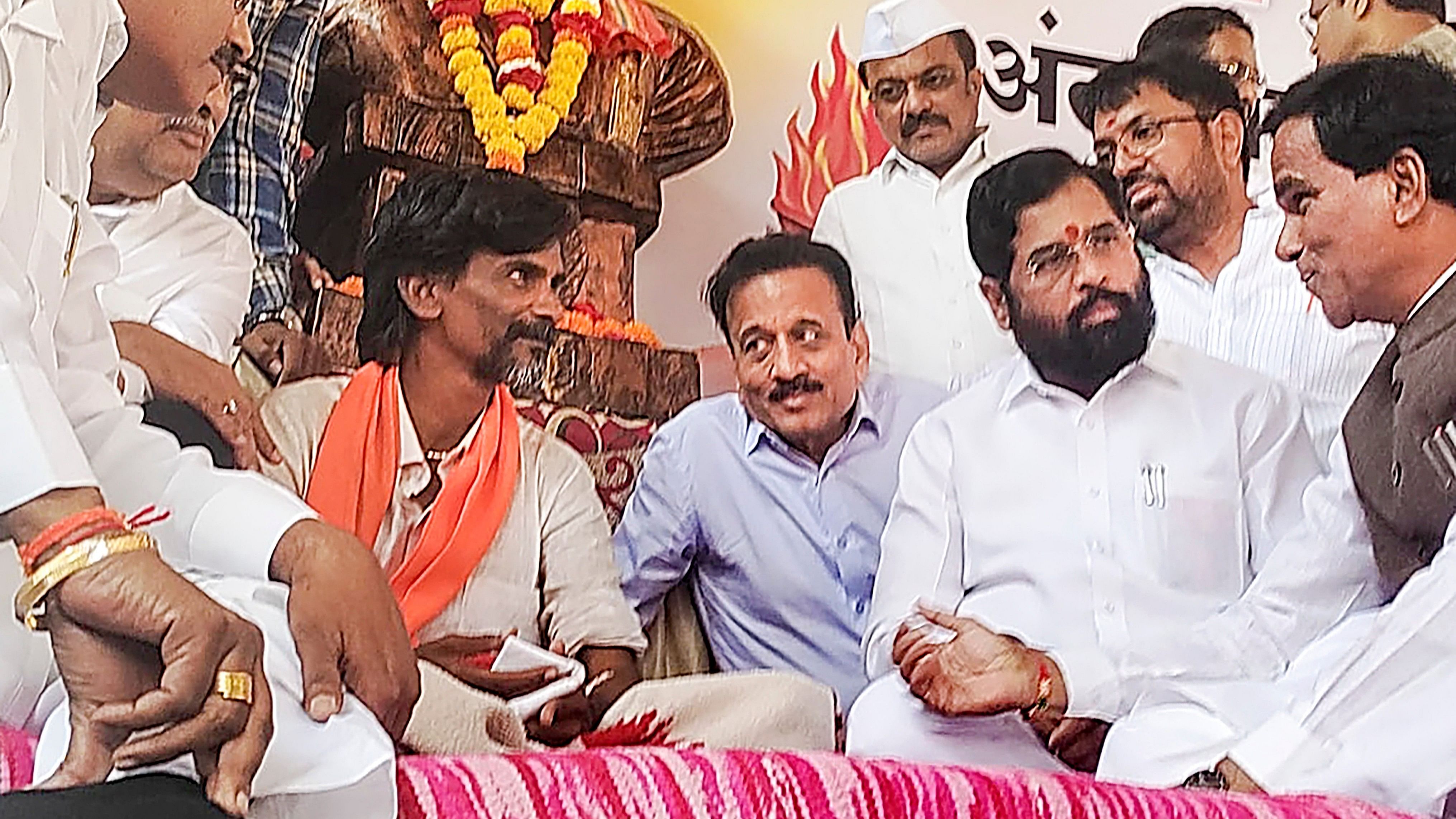 <div class="paragraphs"><p>Maharashtra Chief Minister Eknath Shinde seen here with Maratha quota activist Manoj Jarange Patil</p></div>