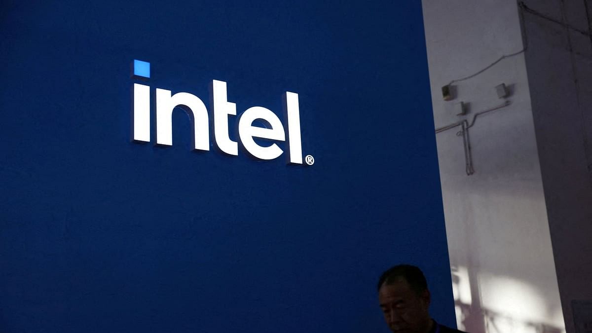 <div class="paragraphs"><p>A man walks past the Intel logo.</p></div>