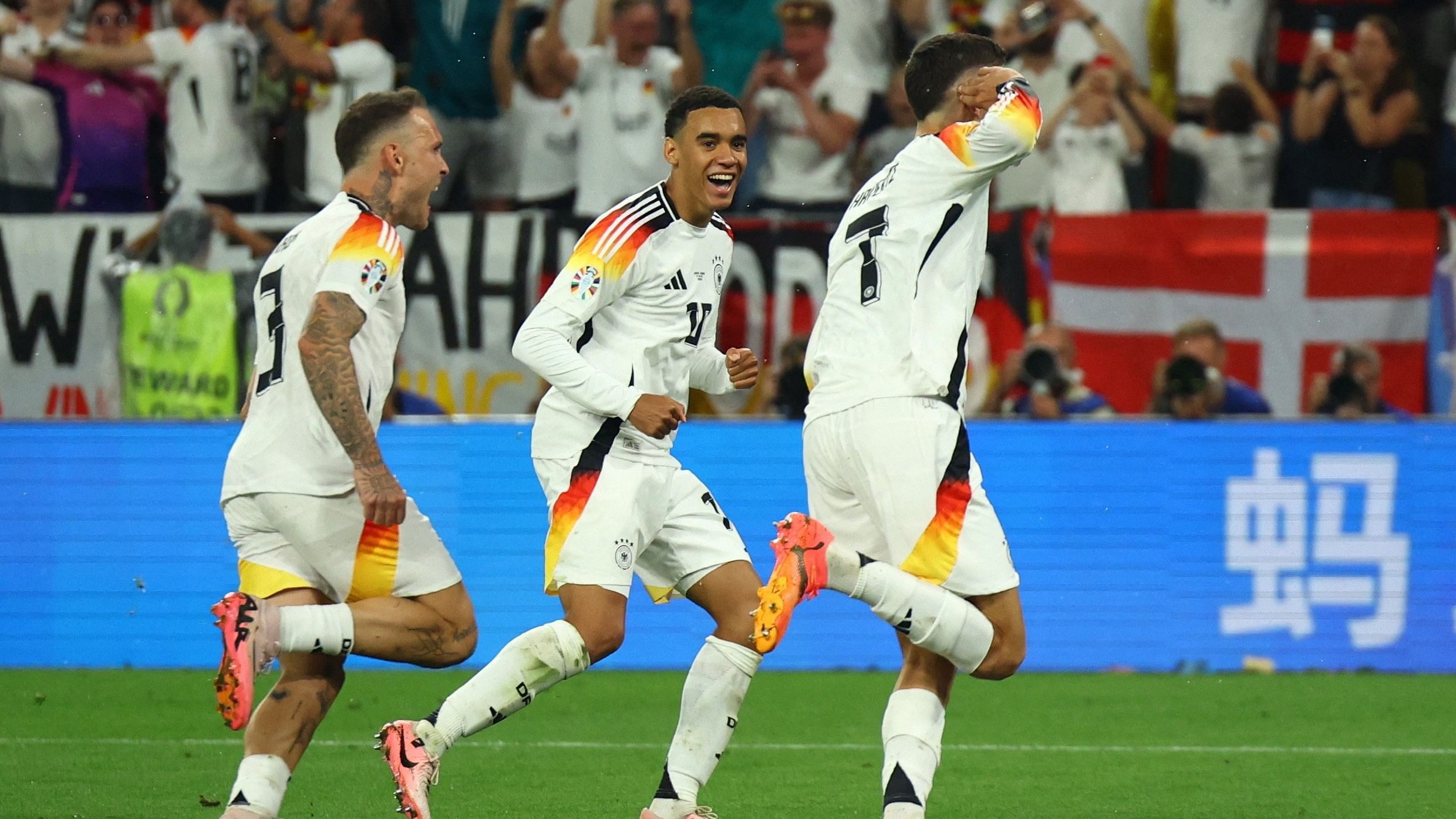 <div class="paragraphs"><p>Germany's Kai Havertz celebrates scoring their first goal with Jamal Musiala and David Raum REUTERS/Thilo Schmuelgen</p></div>