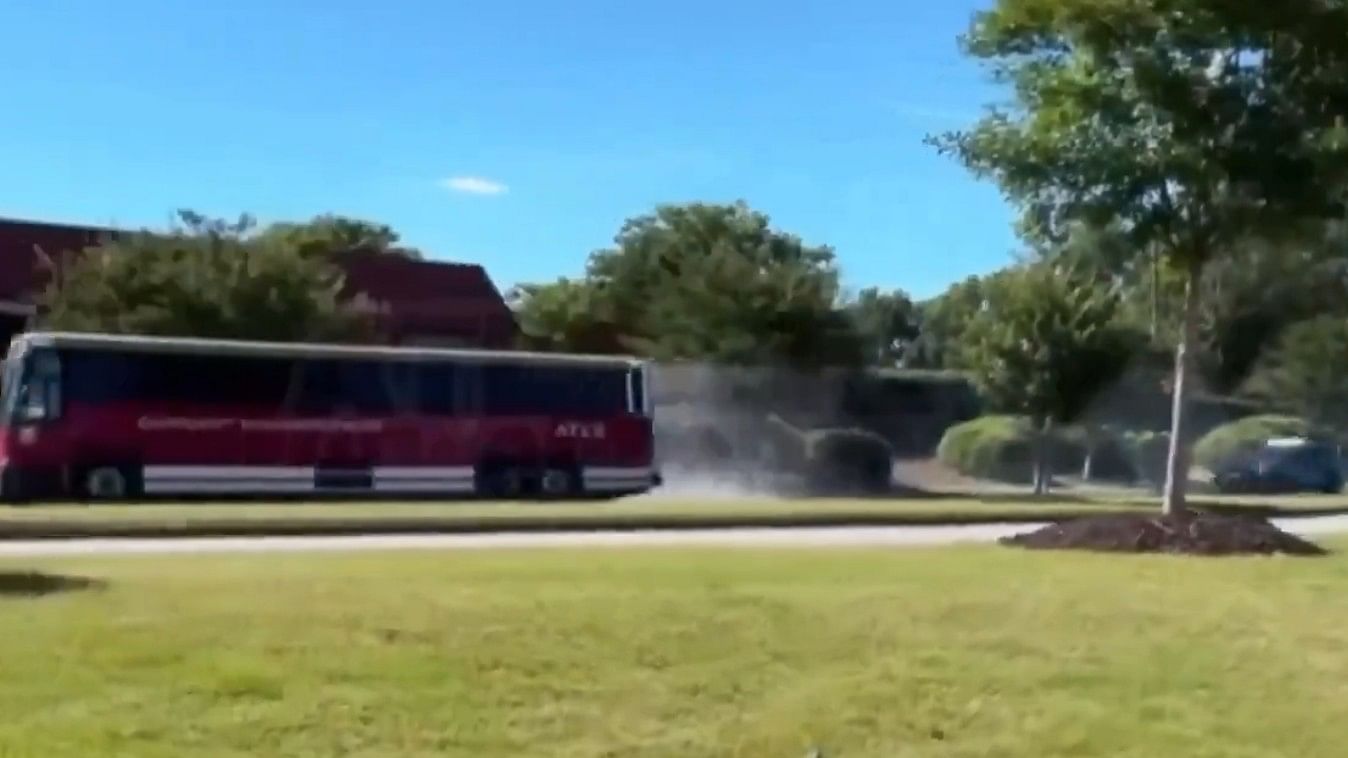 <div class="paragraphs"><p>Screengrab of video showing the hijacked bus and a police car can be seen in pursuit</p></div>