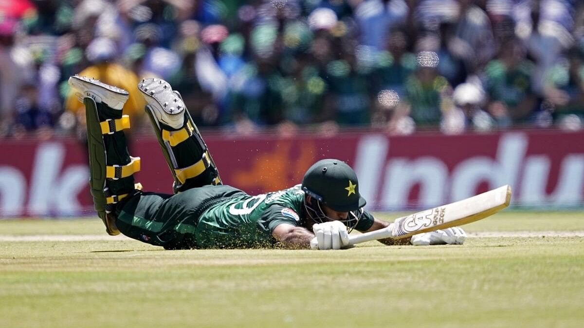 <div class="paragraphs"><p>Pakistan's Fakhar Zaman dives to make it to the crease in super over during the ICC Men's T20 World Cup cricket match between United States and Pakistan.&nbsp;</p></div>