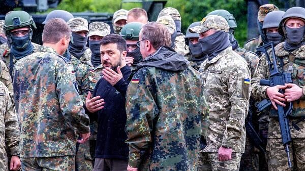 <div class="paragraphs"><p>Ukrainian President Volodymyr Zelenskyy visit to a military training area.</p></div>