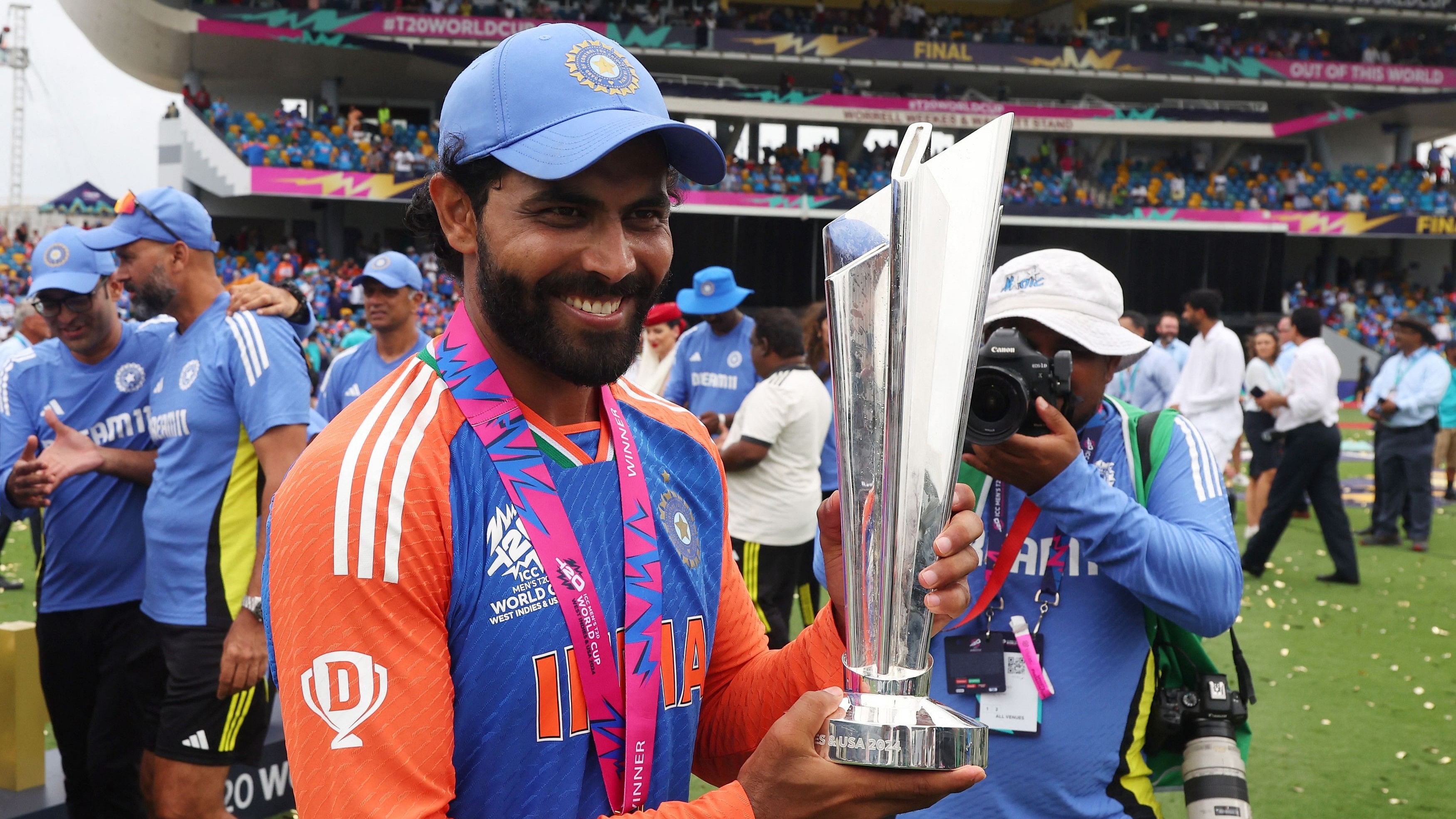 <div class="paragraphs"><p>India's Ravindra Jadeja celebrates with the trophy after winning the T20 World Cup</p></div>