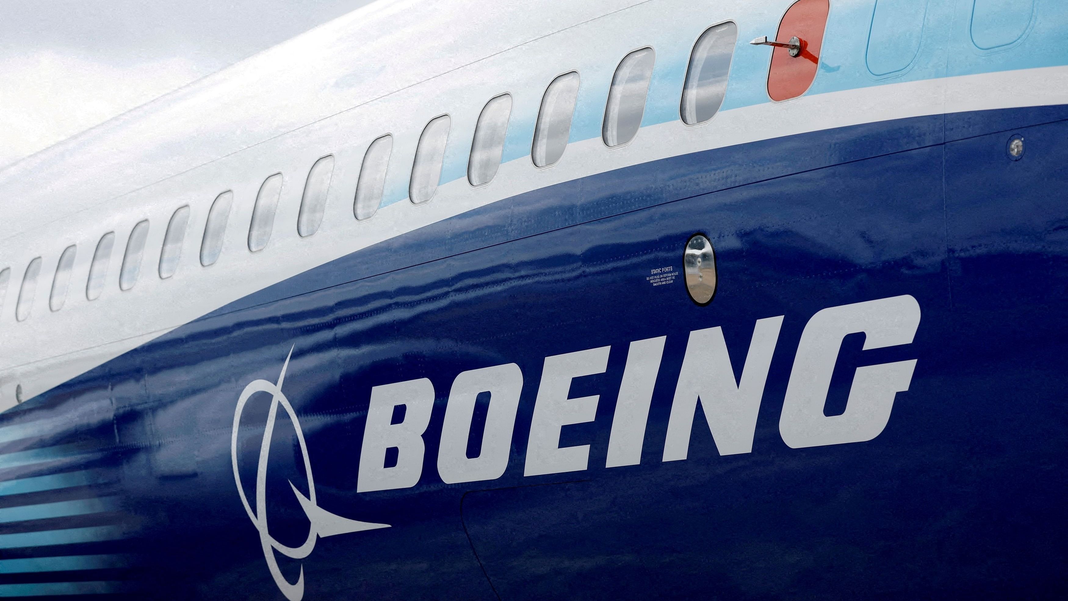 <div class="paragraphs"><p>The Boeing logo is seen on the side of a Boeing 737 MAX at the Farnborough International Airshow</p></div>