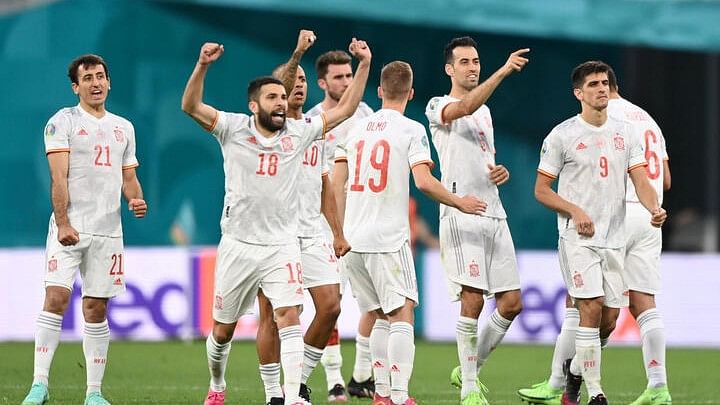 <div class="paragraphs"><p>Spain's Jordi Alba and teammates react during a penalty shootout.</p></div>