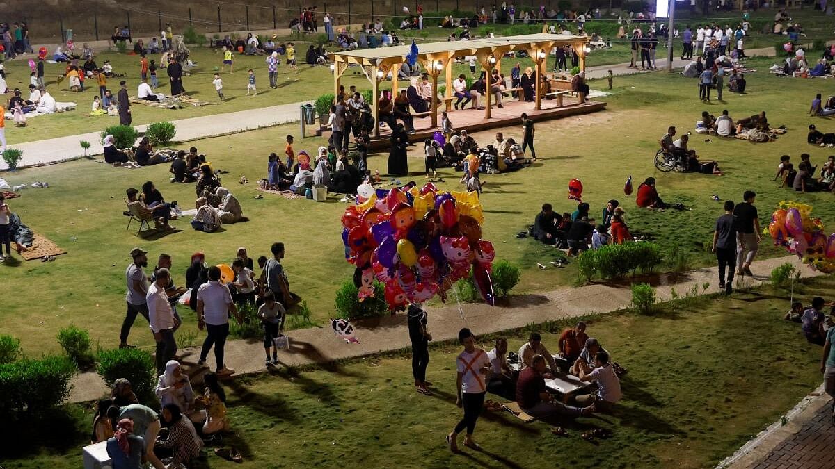 <div class="paragraphs"><p>Iraqi families sit in a park as rebuilding work continues in Mosul, Iraq June 7, 2024, 10 years after Islamic State militants seized control of the city and ruled for three years before being ousted by Iraqi forces and their allies</p></div>