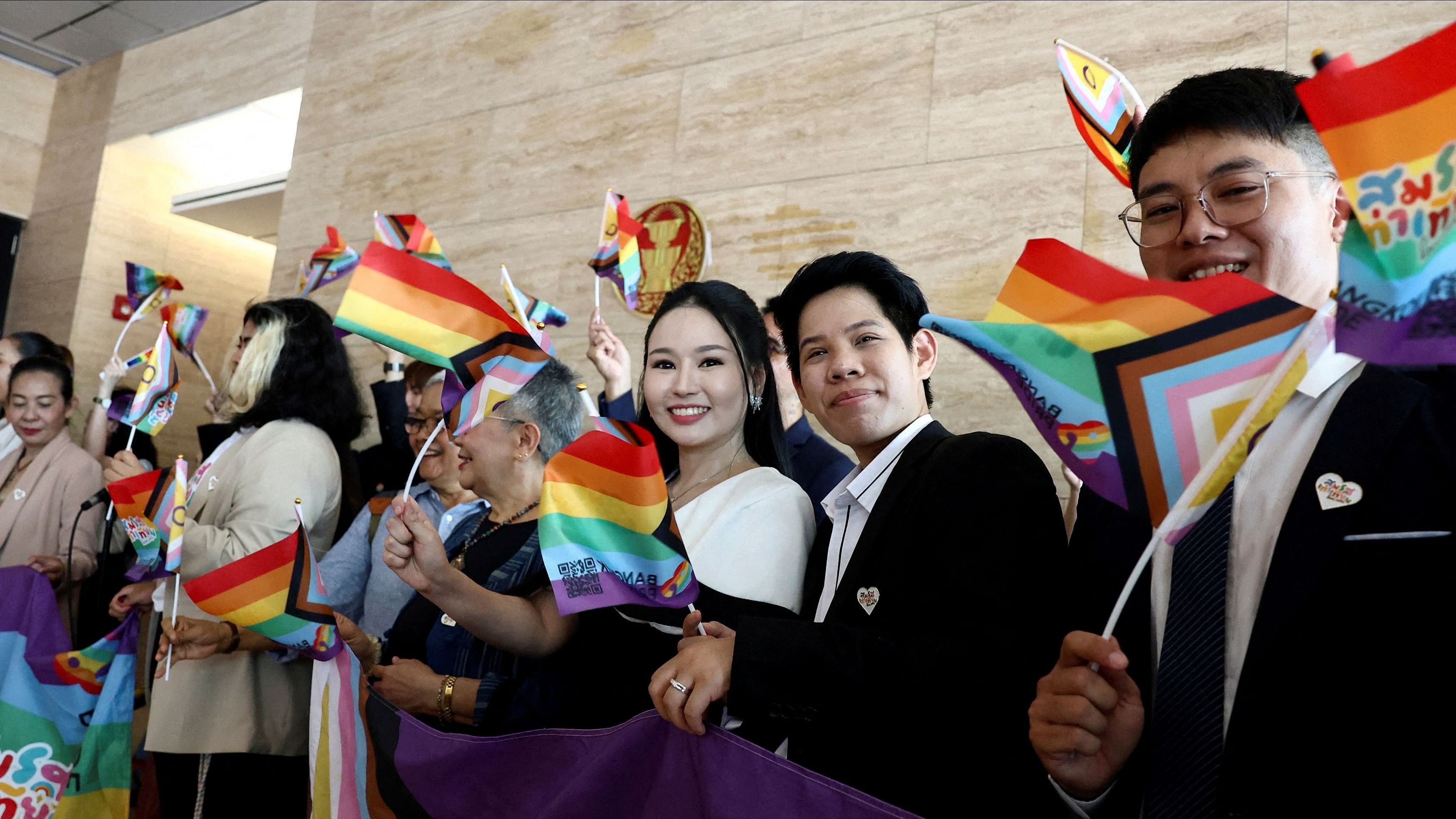 <div class="paragraphs"><p>Members of the LGBTQ+ community react as they arrive ahead of the passing of the marriage equality bill in its second and third readings by the Senate.</p></div>