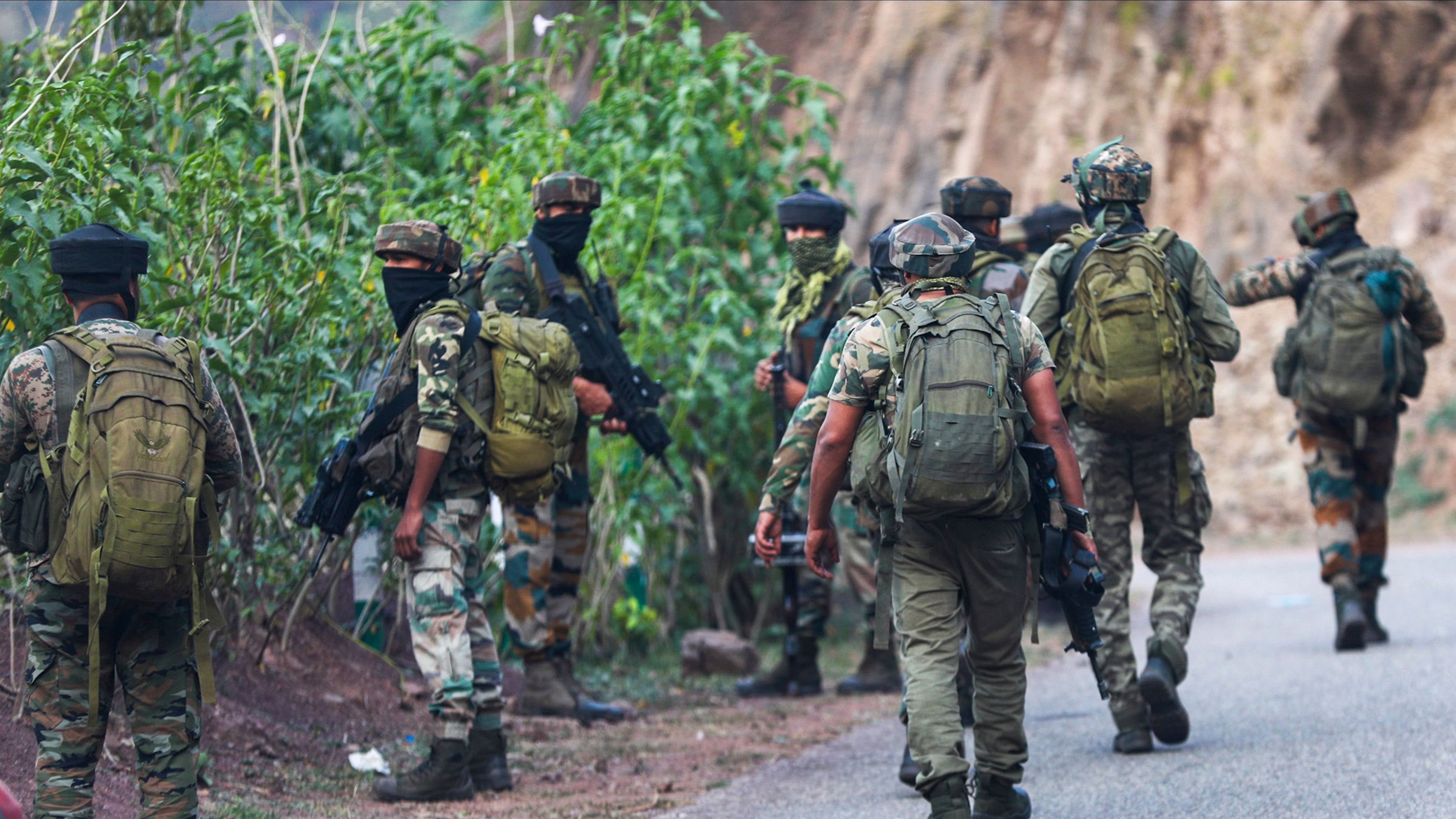 <div class="paragraphs"><p> Army personnel conduct search operation after a bus carrying pilgrims was ambushed by terrorists, in Reasi district of Jammu and Kashmir.</p></div>