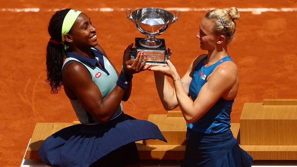 <div class="paragraphs"><p>Coco Gauff of the U.S. and Czech Republic's Katerina Siniakova pose with their trophy after winning the women's doubles final against Italy's Sara Errani and Jasmine Paolini.</p></div>