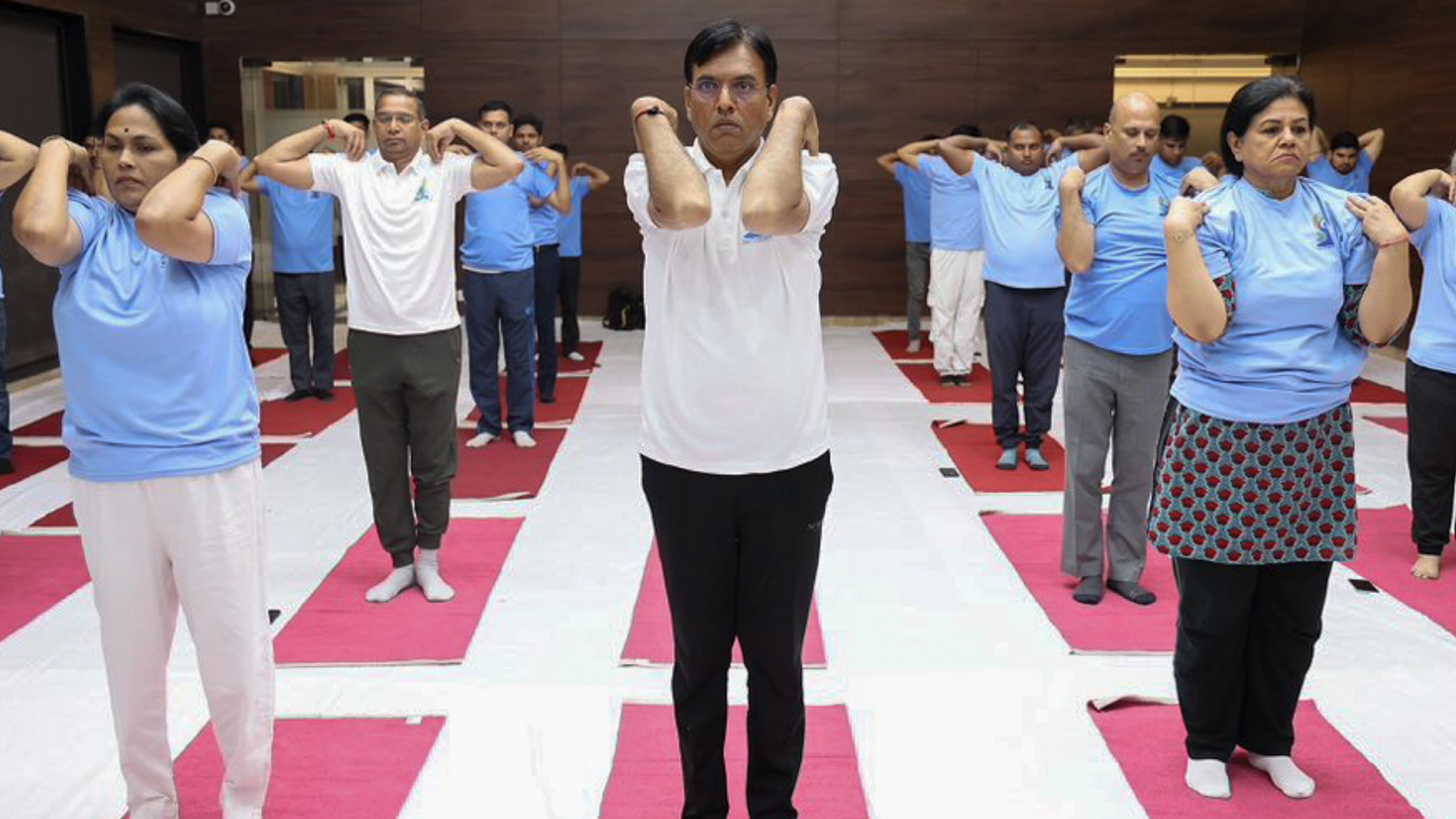 <div class="paragraphs"><p>File photo of&nbsp;Sports Minister Mansukh Mandaviya performing yoga</p></div>