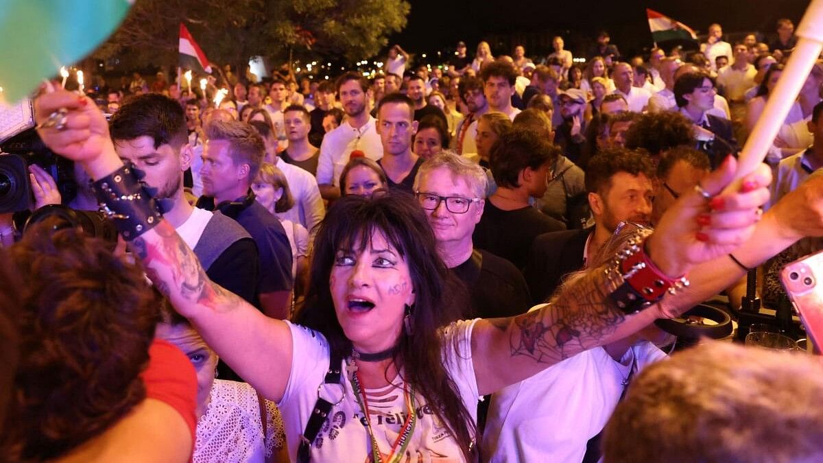 <div class="paragraphs"><p>People&nbsp;attend a gathering after the announcement of the partial results of the European Parliament and municipal elections, in Budapest, Hungary</p></div>