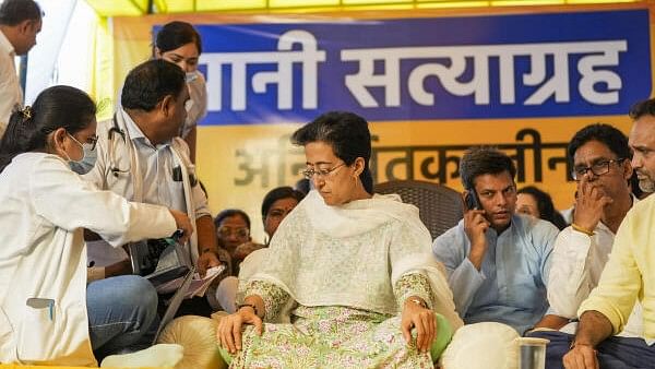 <div class="paragraphs"><p>Officials examine Delhi Minister Atishi during her indefinite hunger strike at Bhogal over the ongoing water crisis in the national capital, in New Delhi, Monday on June 24, 2024.</p></div>