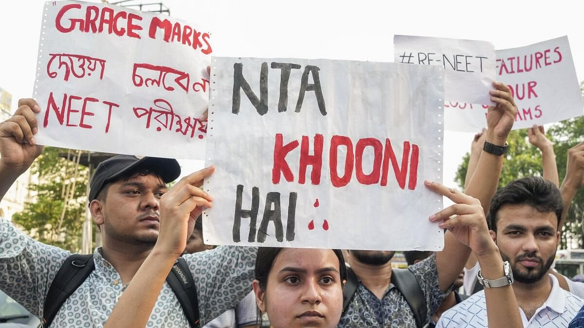 <div class="paragraphs"><p>NEET aspirants take part in a protest rally against the alleged irregularities in the NEET-UG 2024 entrance exam results, in Kolkata, Monday, June 10, 2024.</p></div>