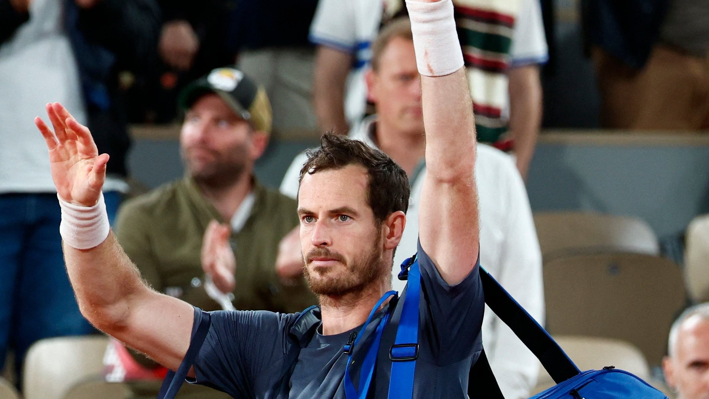 <div class="paragraphs"><p>Britain's Andy Murray waves to the crowd after losing his first round match against Switzerland's Stanislas Wawrinka at the recently concluded French Open.</p></div>