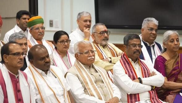 <div class="paragraphs"><p>NDA leaders Shivraj Singh Chouhan, H.D. Kumaraswamy, Manohar Lal Khattar, Dharmendra Pradhan, Nirmala Sitharaman and others during an interaction with Prime Minister-designate Narendra Modi over tea, in New Delhi.</p></div>