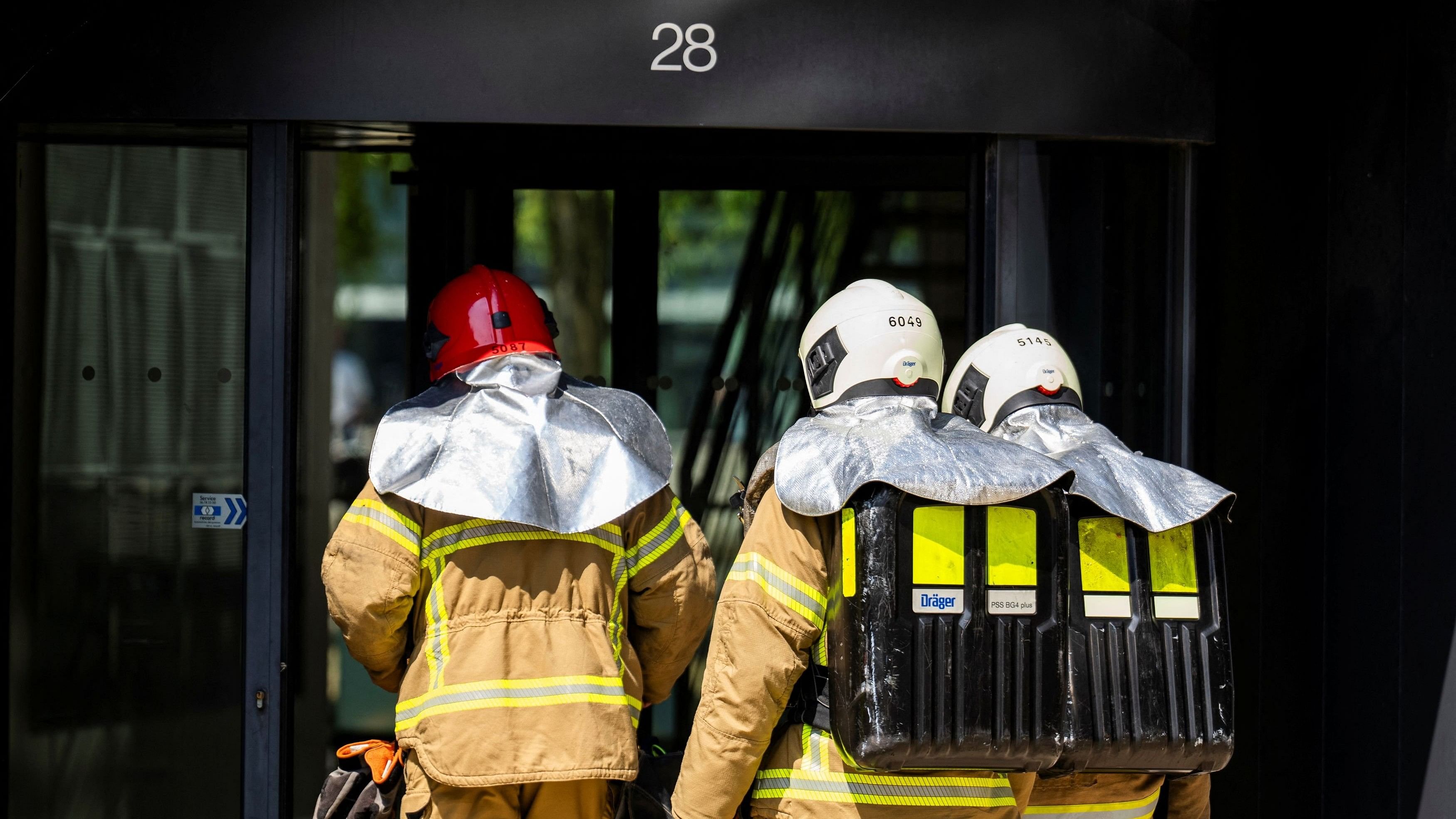 <div class="paragraphs"><p>Firefighters enter a building following a fire in the roof of the Ministry of Taxation in Copenhagen, Denmark on June 27, 2024.   </p></div>