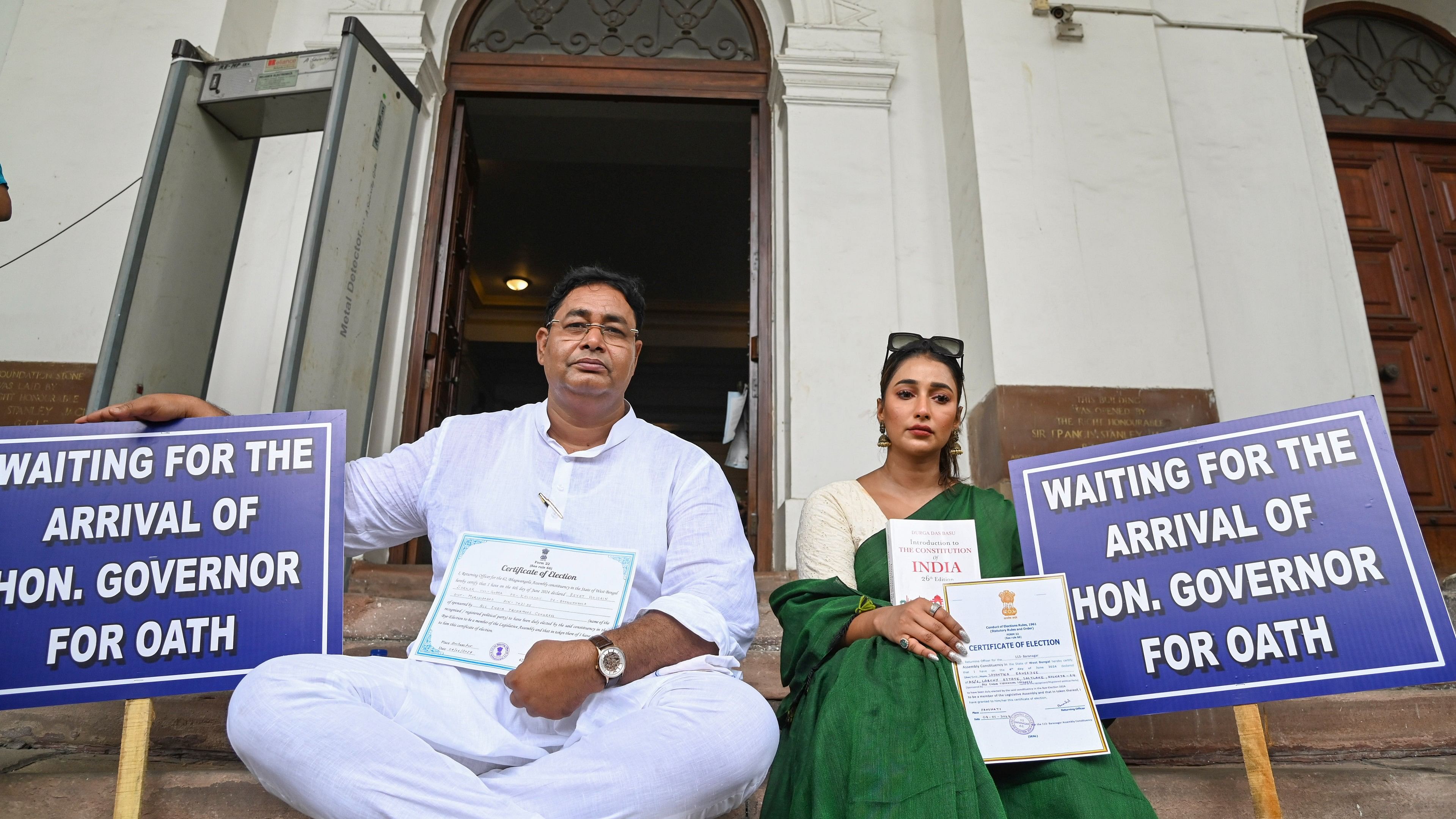 <div class="paragraphs"><p>Newly elected TMC MLAs Rayat Hossain Sarkar and Sayantika Banerjee wait on the West Bengal Legislative Assembly premises for their swearing-in ceremony, in Kolkata, Wednesday, June 26, 2024.</p></div>