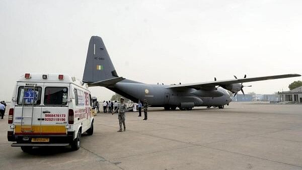 <div class="paragraphs"><p>Bodies of the Kuwait fire tragedy victims being placed in ambulance after they were brought by a special flight.</p></div>