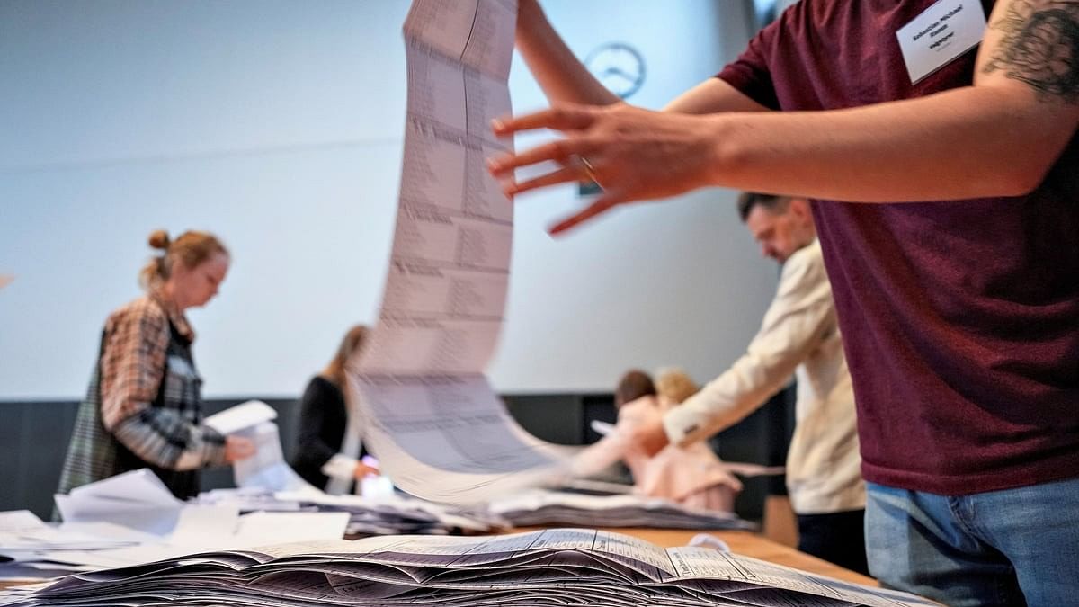 <div class="paragraphs"><p>Poll workers count votes in Denmark's EU elections, in Aalborg, Denmark June 9, 2024.  </p></div>