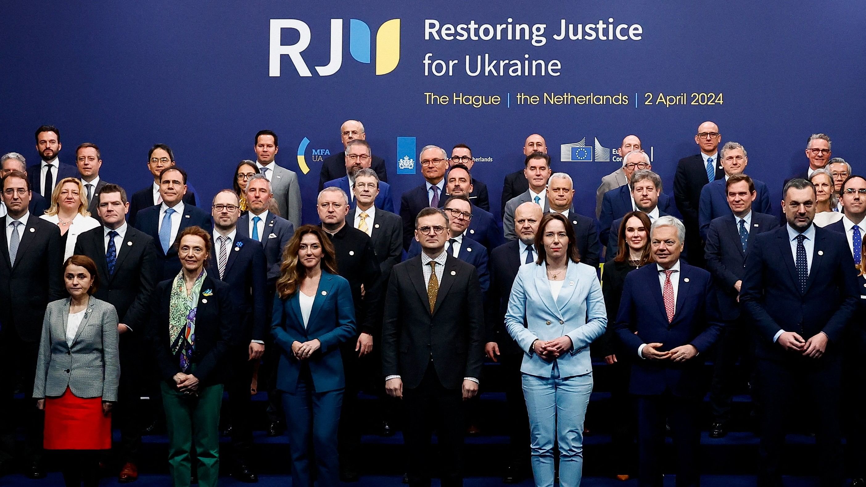 <div class="paragraphs"><p>Ukrainian Foreign Minister Dmytro Kuleba, Dutch Foreign Minister Hanke Bruins Slot, Council of Europe Secretary General Marija Pejcinovic Buric, Dutch Justice Minister Dilan Yesilgoz-Zegerius, European Commissioner for Justice Didier Reynders and other attendees of the international peace conference 'Restoring Justice for Ukraine' posing for a  photo in The Hague, Netherlands.</p></div>