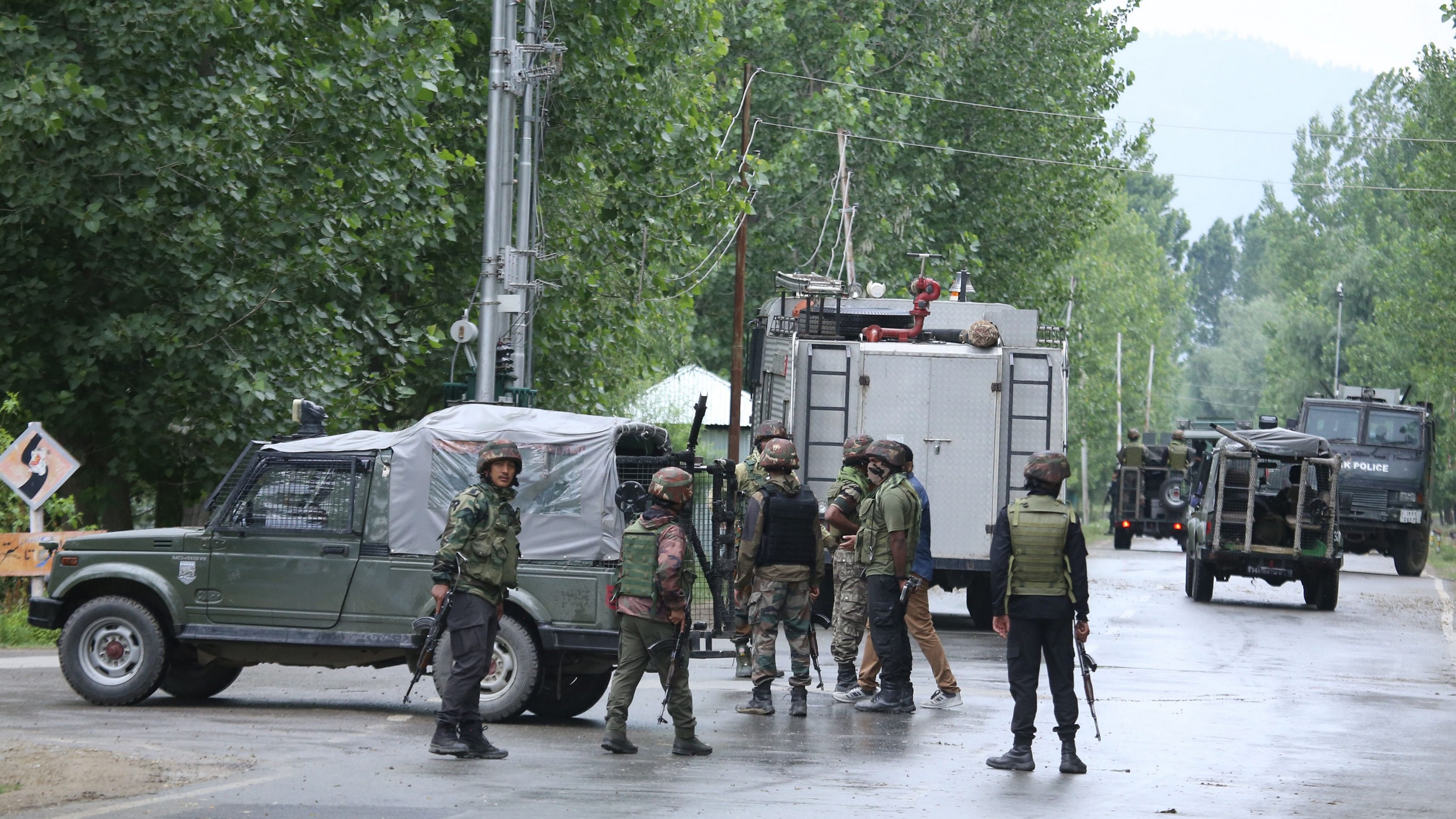 <div class="paragraphs"><p>Security forces personnel during an encounter with militants, in Hadipora, Baramulla, Wednesday.</p></div>