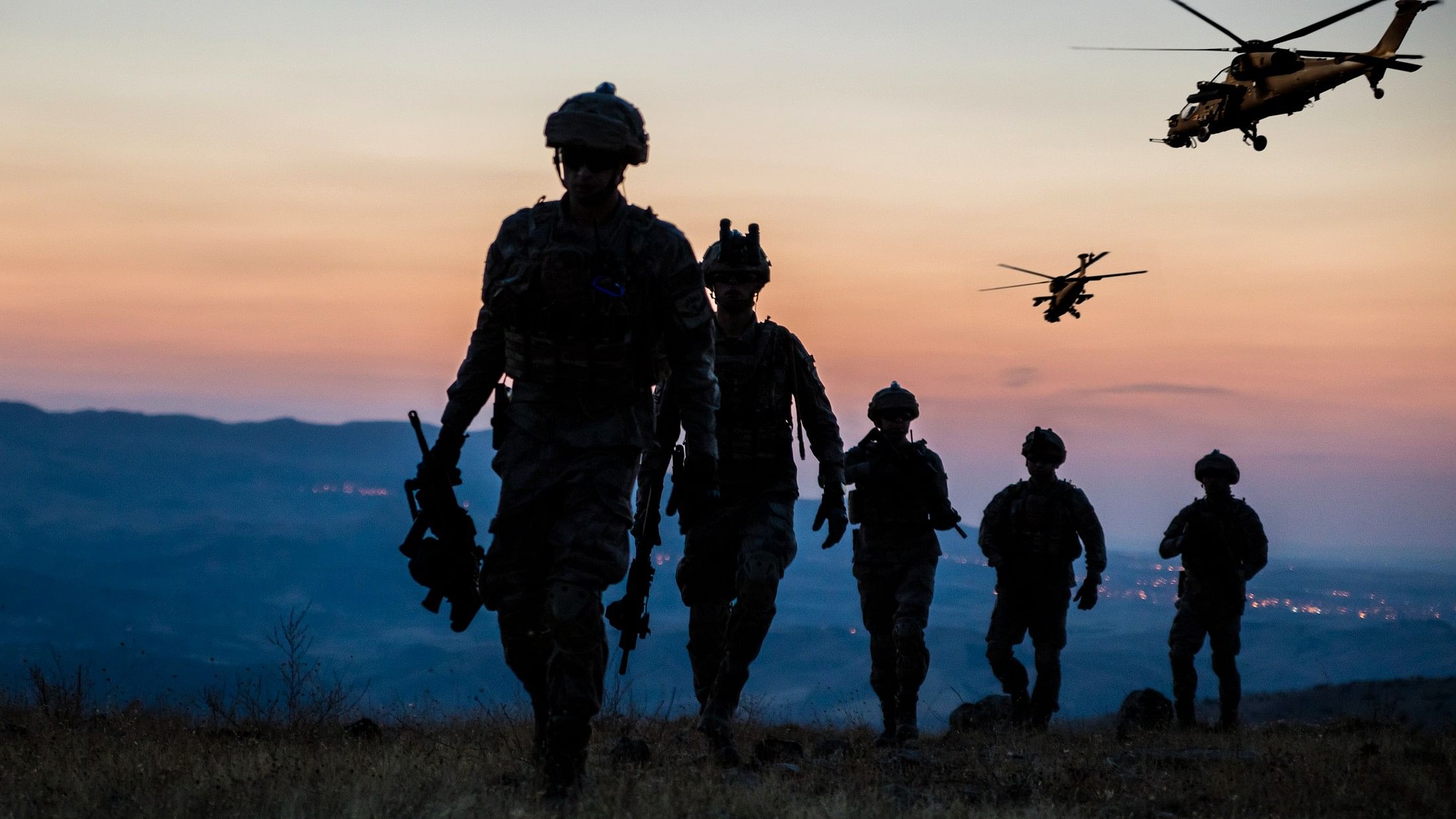 <div class="paragraphs"><p>Representative image showing silhouettes of soldiers.</p></div>